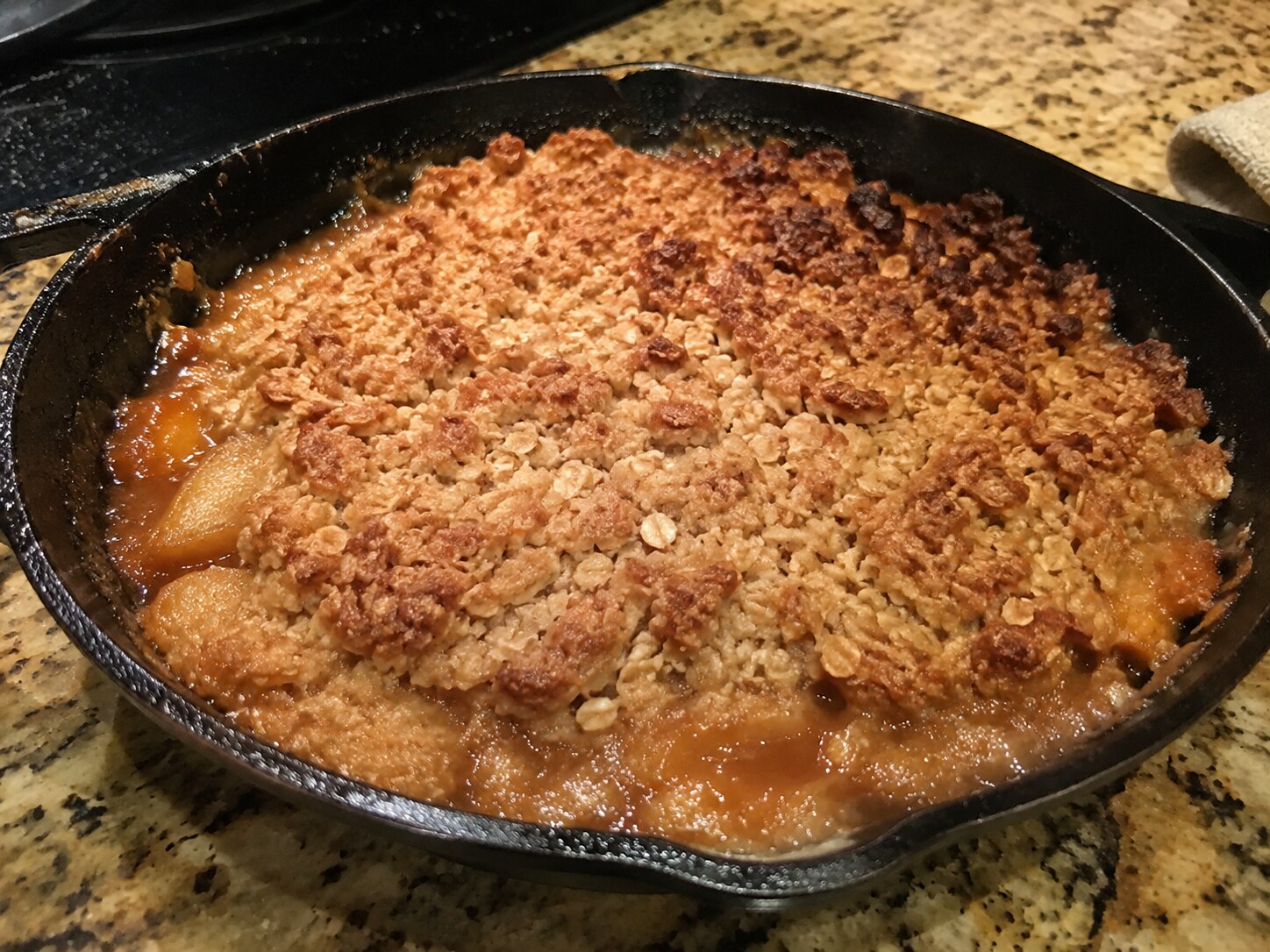 Skillet apple crisp with a golden oat topping